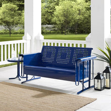 Load image into Gallery viewer, A navy blue outdoor metal sofa glider with a unique basket weave design, positioned on a porch with a white rack and green plant beside it.
